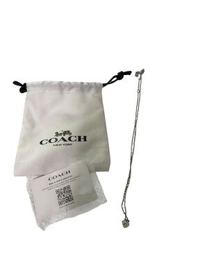 Coach Silver Tone Heart C Logo Pendant Necklace with Dust Bag and Care Card